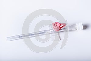 Intravenous cannula on white background photo