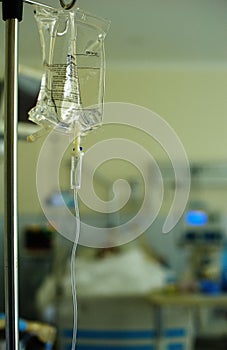 Intravenous infusion drip in emergency threatment room in hospital photo