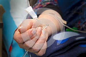 Intravenous infusion therapy on mature woman photo