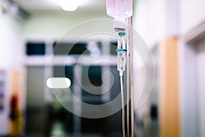 Intravenous therapy iv infusion set and bottle on a pole.