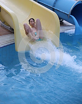 Intrepid child plays on the slide pool