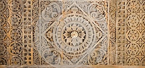 Intricate architectural detail and sculpture of historic Jain temple in Ranakpur, Rajasthan, India