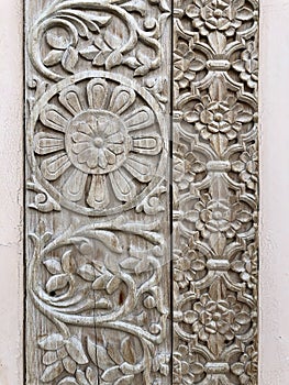 Intricate carved wood door details