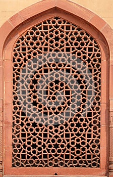 Intricate carving of stone window grill at Humayuns Tomb, Delhi