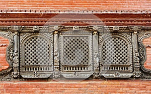 Intricate carving on windows photo