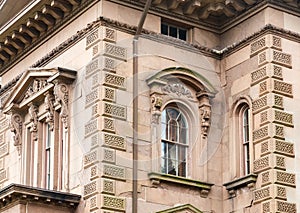 Intricate Details on Old Brown Stone Home