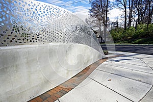 Intricate FOLIAGE Metal Design with Curving Sidewalk