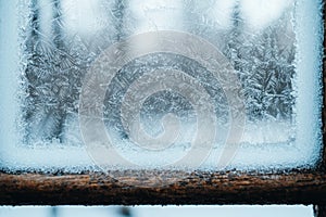 Intricate frost patterns on a window