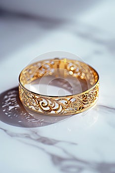 Intricate gold bangle displayed elegantly