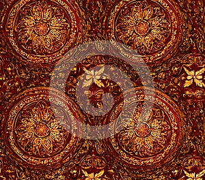 Intricate Gold and Red Mandala Pattern A Stunning Visual Texture