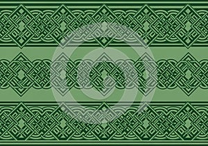 Intricate green and dark green pattern with interlocking Celtic