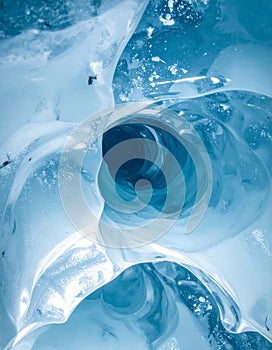 Intricate Ice Cave Interior with Blue Tones and Tunnel Formations Natural Light
