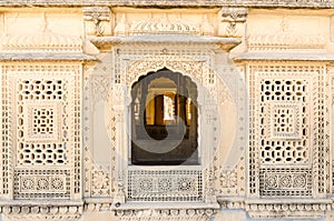 The intricate Jain temple Adeshwar Nath in Amar Sagar Jaisalmer Rajasthan India photo