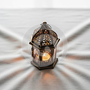 With intricate leaf and geometric patterns casting light on a