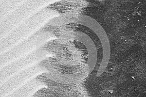 Intricate patterns form in the sand