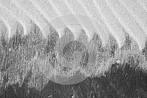 Intricate patterns form in the sand