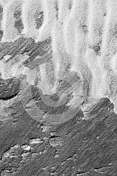 Intricate patterns form in the sand