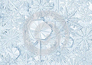 Intricate snowflakes of varying sizes and shapes cover the image,