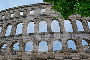 Intricate stonework and arches of the Pula Arena in Croatia