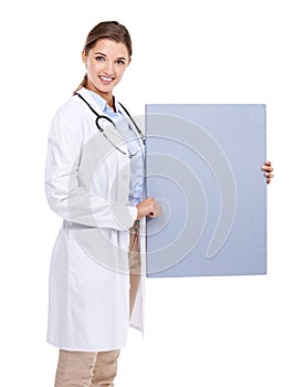 Introducing the new healthcare plan. Portrait of an attractive young woman holding copyspace.