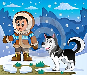 Inuit boy with Husky dog photo