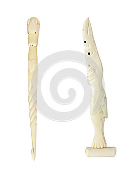 Inuit carvings made of walrus ivory and bone, tupilaq photo