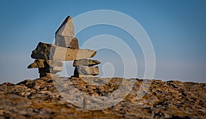 Inukshuk symbol on a boulder in Newfounland and Labrador