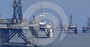 Invergordon decommissioned jackup rigs path the way to the port photo