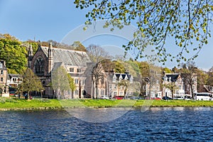 Inverness city with street of historic buildings closed river Ness in Scotland, United Kingdom of Great Britain and Northern