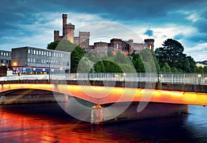 Inverness skyline at night with Ness bridge, Scotland - UK