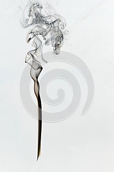 Inverted Black smoke figure on white background