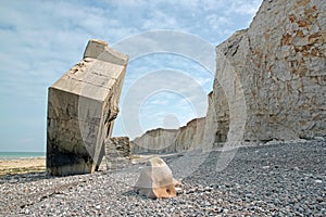 Inverted Blockhouse of Sainte-Marguerite-sur-mer. Pebbles, rocks, and cliffs. Bay of Somme France