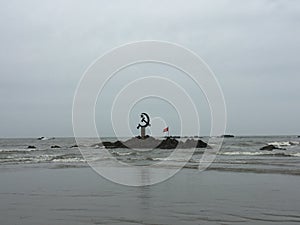 The inverted hammer and sickle symbol of Communism off the coast of Kunoor.