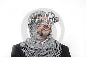 invest, businessman with medieval executioner in metal and silver glasses. concept of protection of savings and money