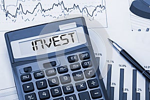 Invest displayed on calculator photo