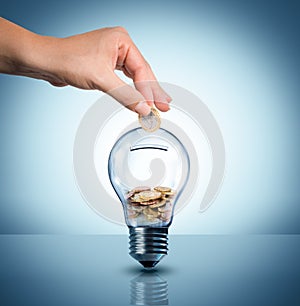 Invest to energy concept - euro in bulb photo