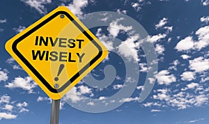 Invest wisely caution sign photo