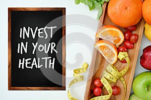 Invest in your health , Healthy lifestyle concept with diet and fitness , Get fit in  , fitness equipment and healthy food