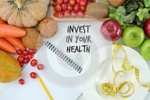 Invest in your health , Healthy lifestyle concept with diet and fitness , Get fit in  , fitness equipment and healthy food