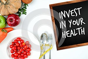 Invest in your health , Healthy lifestyle concept with diet and fitness , Get fit in  , fitness equipment and healthy food