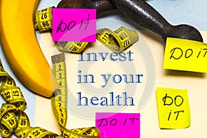 Invest in your health - the inscription on the sheet of paper wi