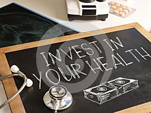 Invest in your health is shown using the text and picture of dollars