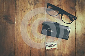 Investigation concept. tape recorder, cassete and glasses