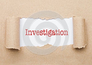 Investigation text appearing behind brown paper