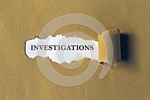 Investigations word on white