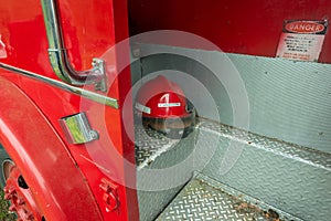 An Investigator Helmet in an Old Red Fire Truck