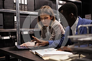 Investigators working late at night