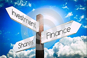 Investment, finance, shares concpt - signpost with three arrows