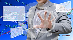 Investor analyzing data with touch screen computer