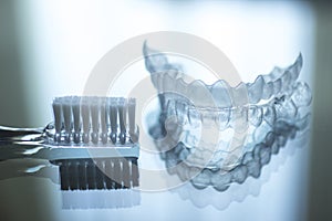 Invisible dental teeth brackets aligners retainers and toothbrus